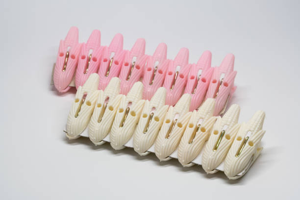istock Colorful plastic clothespins in white background 1139428220