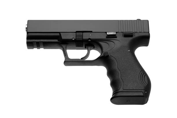 istock black gun pistol isolated on white background 1139429270