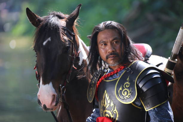 istock Man In Warrior Costume With Horse 1139432700