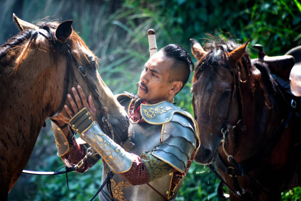 istock Man Riding Horses 1139433153