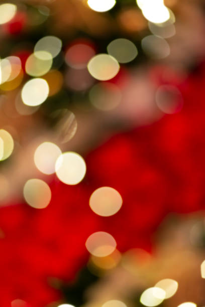 istock Blurred festive background made with Christmas tree lights and decorations. New year backdrop. Perfect design for warm family holidays projects. 1139436459