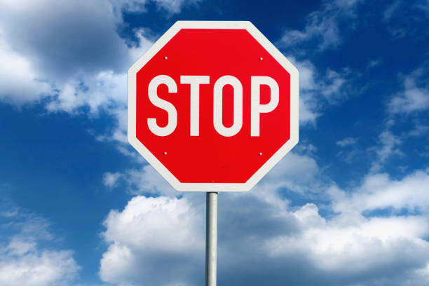 istock Stop sign in front of a dramatic sky 1139436973