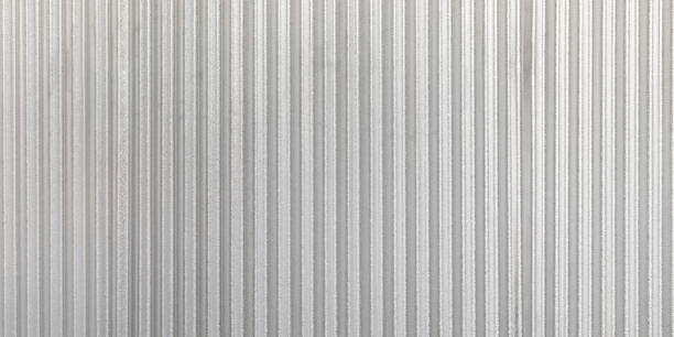 гофрированный серый металлический панорамный фон стены. ржавый цинк гранж текстуры и фона. - corrugated steel стоковые фото и изображения