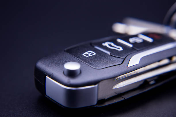 car key and remote central locking car key and remote central locking key ring photos stock pictures, royalty-free photos & images