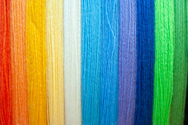 istock Many multi colored yarn strings for design background. Texture of colored thread. Concept of sewing, hobby image. 1139442833