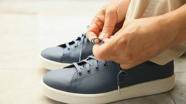 istock Men wearing shoes on marble floor, Backgrounds 1139443025