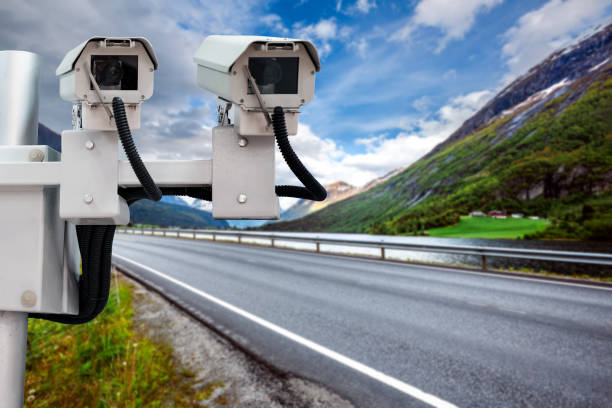 radar speed control camera on the road - speeding ticket imagens e fotografias de stock