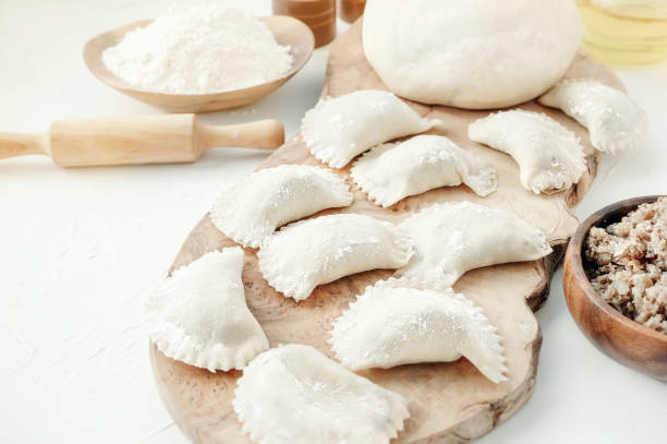 istock Homemade cooking dumplings with meat. Close-up. Selective focus 1139445111