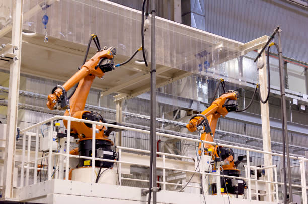istock Modern robots in an automated heavy industry plant. 1139445396