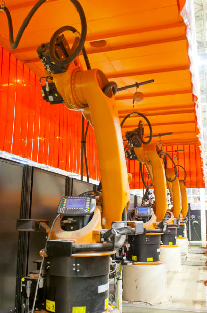 istock Modern robots in an automated heavy industry plant. 1139445397