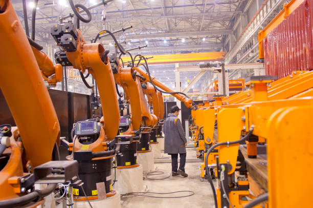 istock Modern robots in an automated heavy industry plant. 1139445399