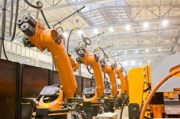 istock Modern robots in an automated heavy industry plant. 1139445400