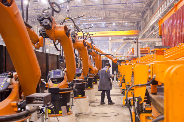 istock Modern robots in an automated heavy industry plant. 1139445413