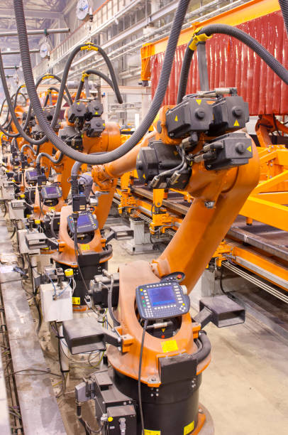 istock Modern robots in an automated heavy industry plant. 1139445414