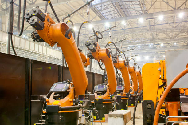 istock Modern robots in an automated heavy industry plant. 1139445420