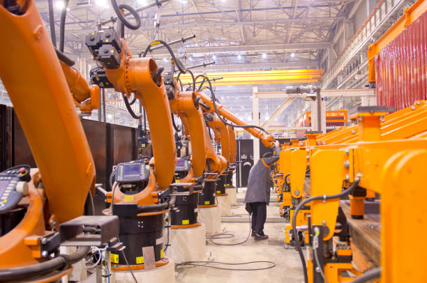 istock Modern robots in an automated heavy industry plant. 1139445423