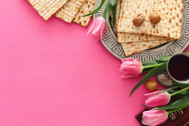 istock Pesah celebration concept (jewish Passover holiday). Traditional book with text in hebrew: Passover Haggadah (Passover Tale) 1139446620