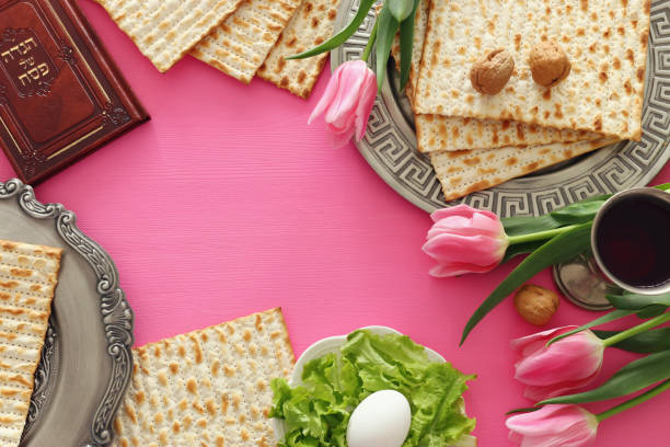 istock Pesah celebration concept (jewish Passover holiday). Traditional book with text in hebrew: Passover Haggadah (Passover Tale) 1139446623