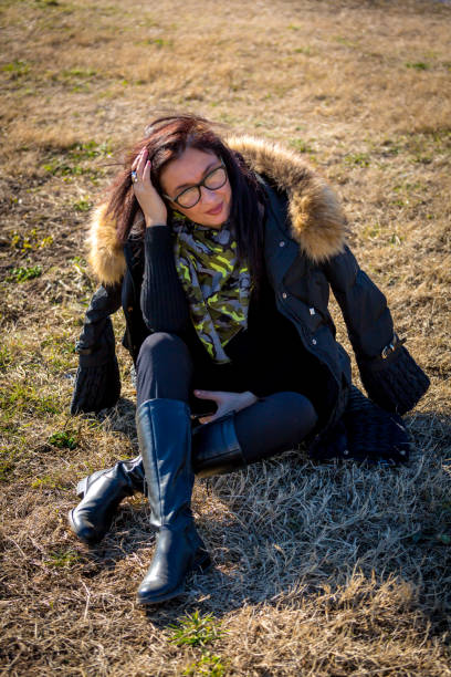 istock Woman in public park 1139451934