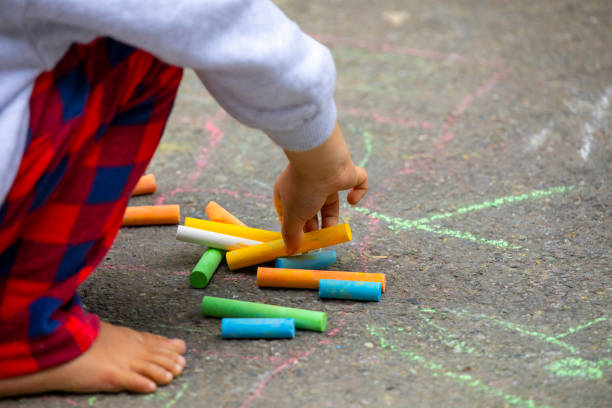 istock Outdoor, kid, floor, chalk, graffiti 1139452030