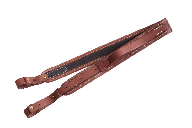 istock leather shoulder strap for a gun isolated on white background 1139452737