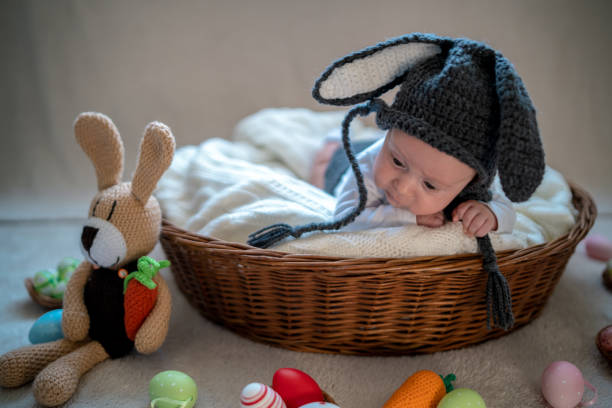 istock Little baby bunny in a basket Easter 1139452799