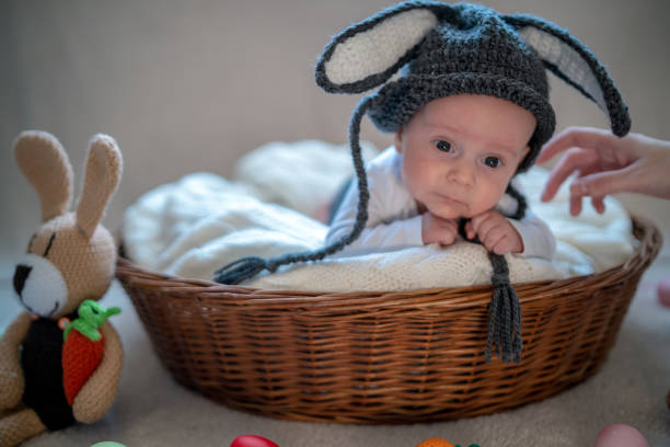 istock Little baby bunny in a basket Easter 1139452887