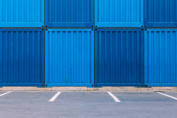 istock Dark blue and light blue containers and parking spots 1139455120