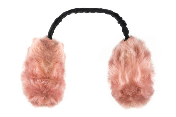 istock Pink fluffy winter earmuffs isolated on white background 1139455520