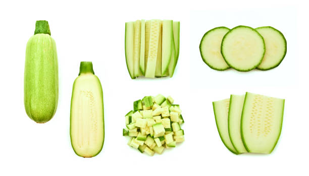 istock fresh green zucchini with slice isolated on white background 1139456817