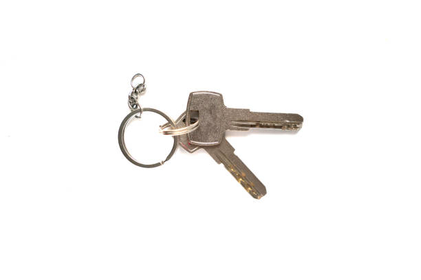 istock metal apartment key isolated on white background 1139457860