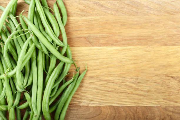 istock fresh green beans on a wooden background 1139458182