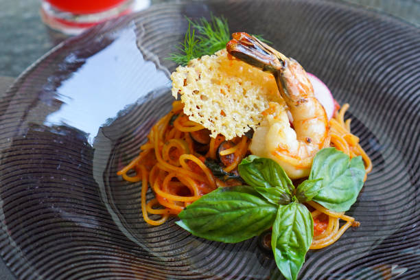 Spaghetti pasta with prawn in creamy tomato sauce
