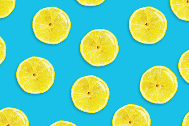 istock Sliced juicy lemon on a blue background. Fresh fruits. Fruit background. 1139462289