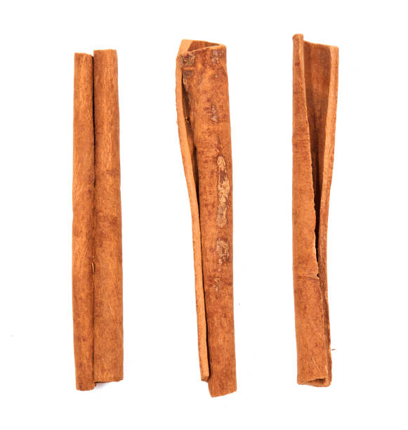 istock Cinnamon sticks and powder, isolated on white background 1139463186