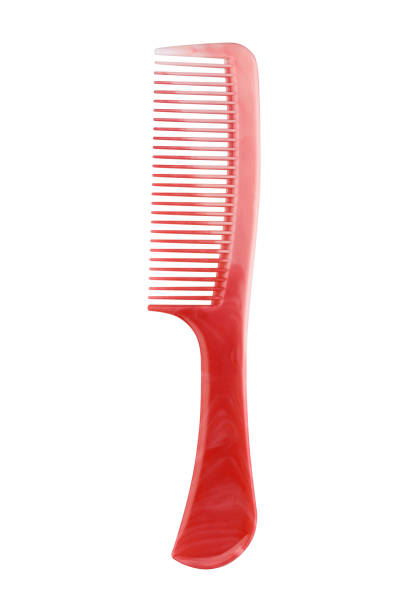 istock Red plastic comb with handle, isolated on transparent or white background 1139465027