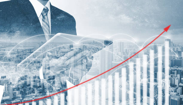 istock Double exposure, Businessman working on digital tablet, with hologram analysis increasing financial graph. Business growth and investment 1139465164
