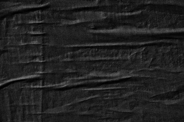 istock Dark black blank paper backgrounds creased crumpled surface old torn ripped posters grunge textures placard 1139468899