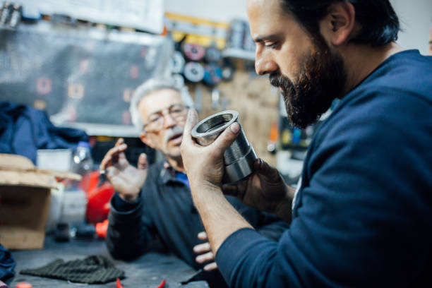 engineer is checking gear bearing - ball bearing imagens e fotografias de stock