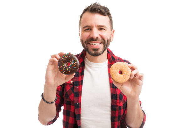 istock Man With Mouthwatering Dessert 1139470352