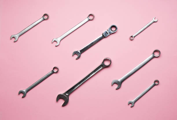 istock A few wrenches on a pink background. 1139474349