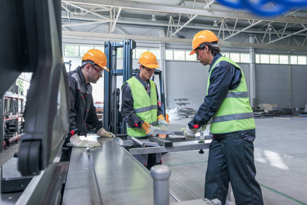 istock Team of workers in CNC factory 1139489466