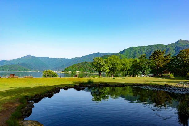 istock Green mountain and pond in Japan 1139489618