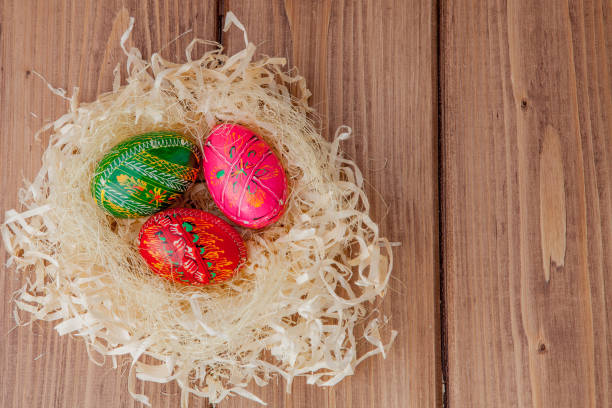 istock Colorful Easter eggs on wooden background with copy space 1139490855