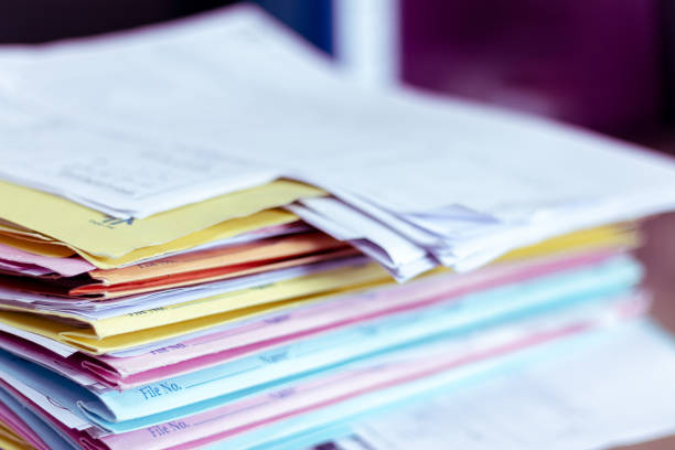 istock Stack of documents placed on a business desk in a business office. 1139496725