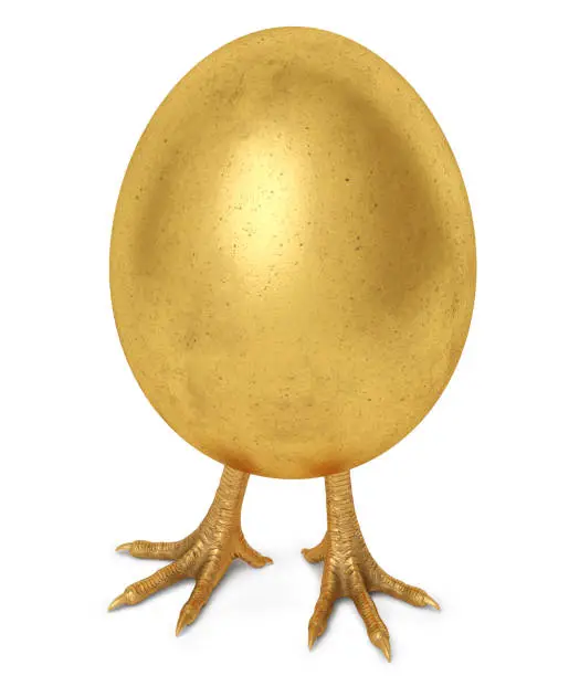 Photo of golden egg with golden chicken feet
