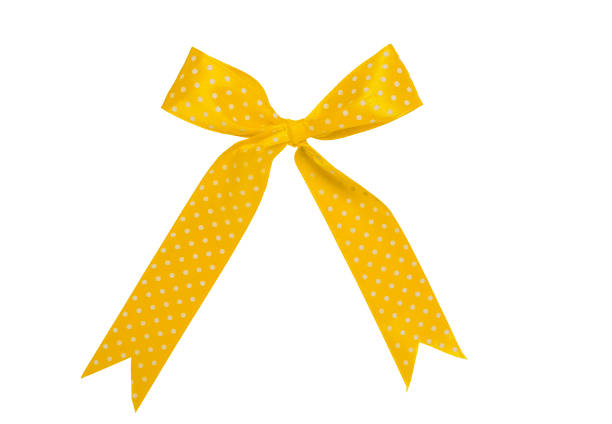 Yellow bow with white polka dots. For designers.