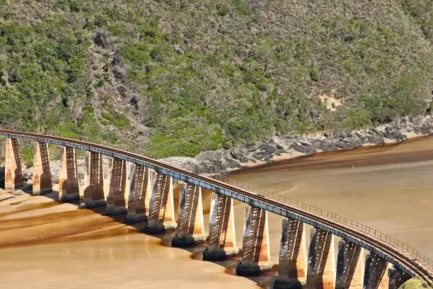 Photo of Kaaimans River Railway Bridge, Wilderness, South Africa. This is a popular tourist attraction on the Garden Route.