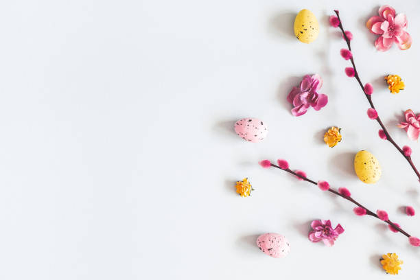 istock Easter composition. Easter eggs, flowers on pastel gray background. Flat lay, top view, copy space 1139504830