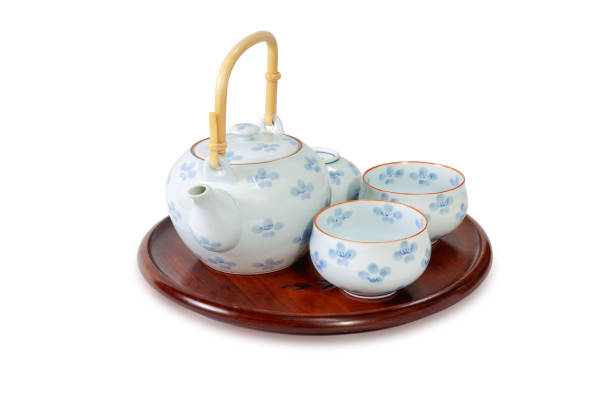 Ceramic teapot and cup set isolated on a white background. File contains with clipping paths so it is easy to work.